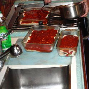 Cutting board fitting over half of the sink